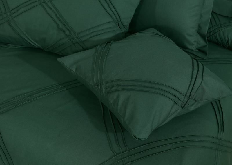 green design on bed sheet