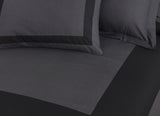 black sheets on bed