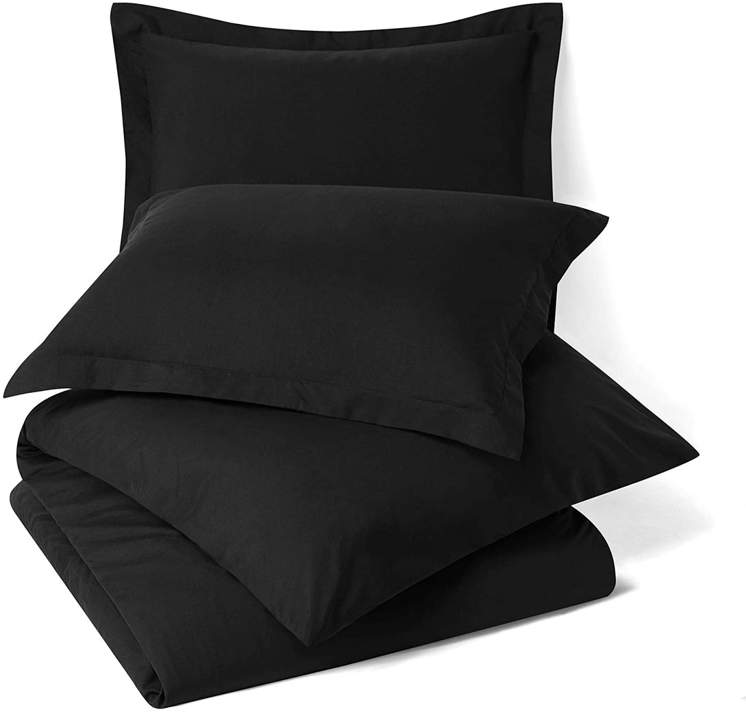 black sheets on bed